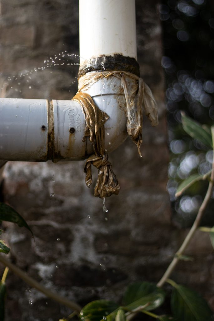 Leaking Pipe with Water Dripping, Suggesting Need for Plumbing Repair Near Me